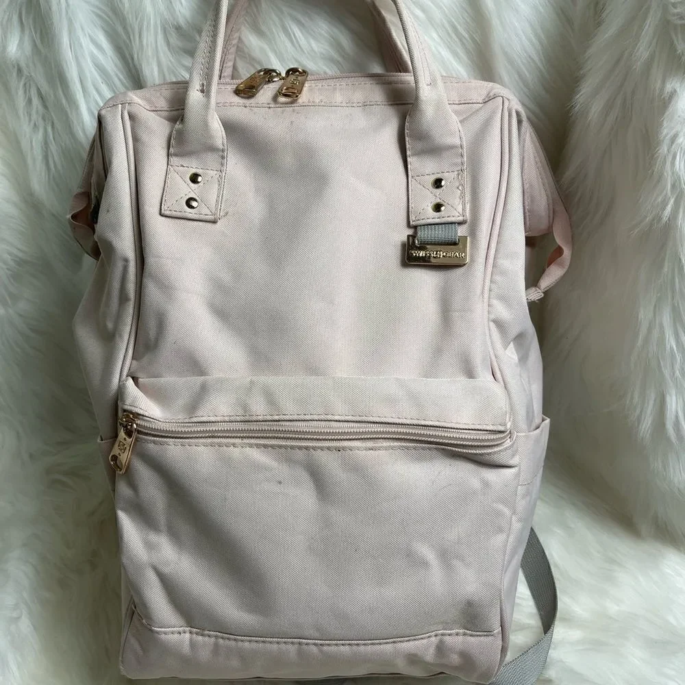Swiss Gear light pink canvas multi purpose backpack with Rose gold Hardw…